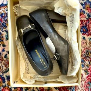 Women’s Enzo shoes.